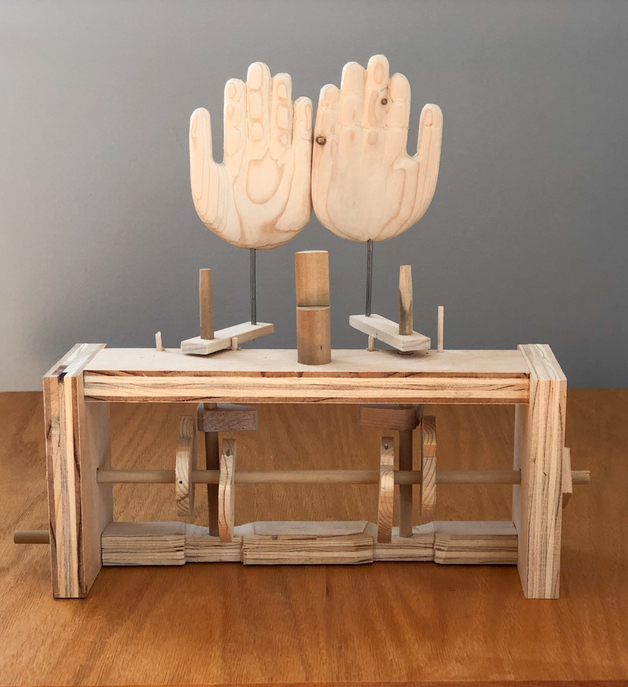 Peek-a-boo machine on table